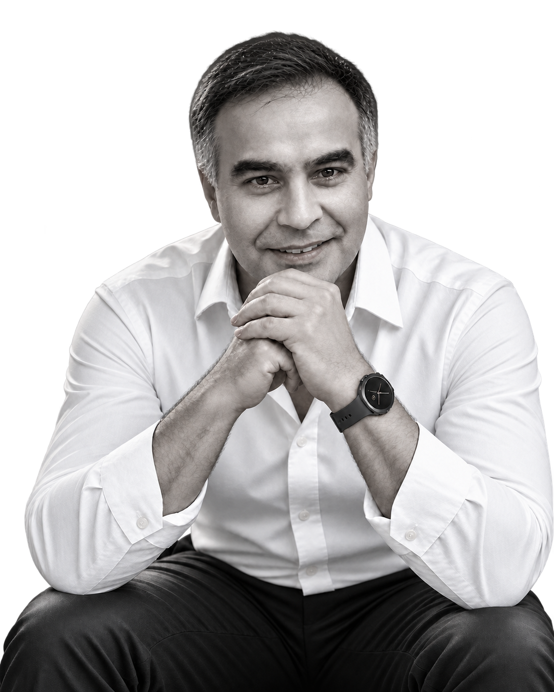 Black-and-white portrait of Pedro Estoura wearing a white shirt, leaning forward with hands clasped